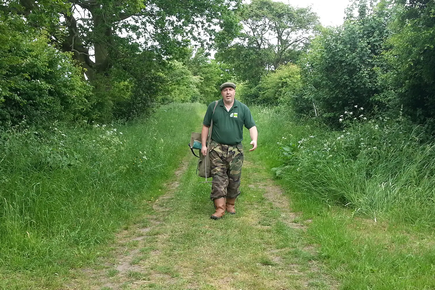 Mark Cotton of Norfolk Environmental Pest Solutions walking along a farm track in Norfolk